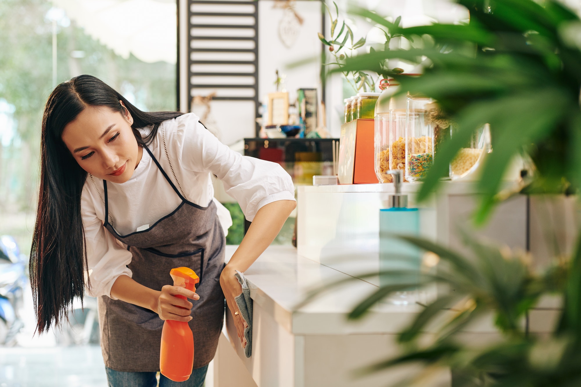 Cleaning a café counter
